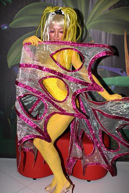 Featured is a photo from the 2012 Australasian Gaming Expo in Sydney, Australia of a body-art model posing as a butterly to promote Paltronics Games' "Jungle Madness" Interactive/Social Game.  Photo is by Eva Rinaldi and is used courtesy of the Creative Commons Attribution Share Alike Generic 2.0 License.  (http://commons.wikimedia.org/wiki/File:Australasian_Gaming_Expo_Trade_Exhibition,_Paltronics_(7836272306).jpg)